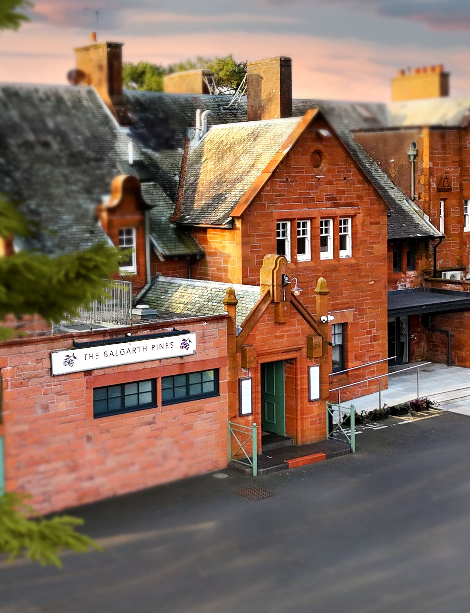 The front of The Balgarth Pines, a red sandstone villa on Dunure Road in Doonfoot